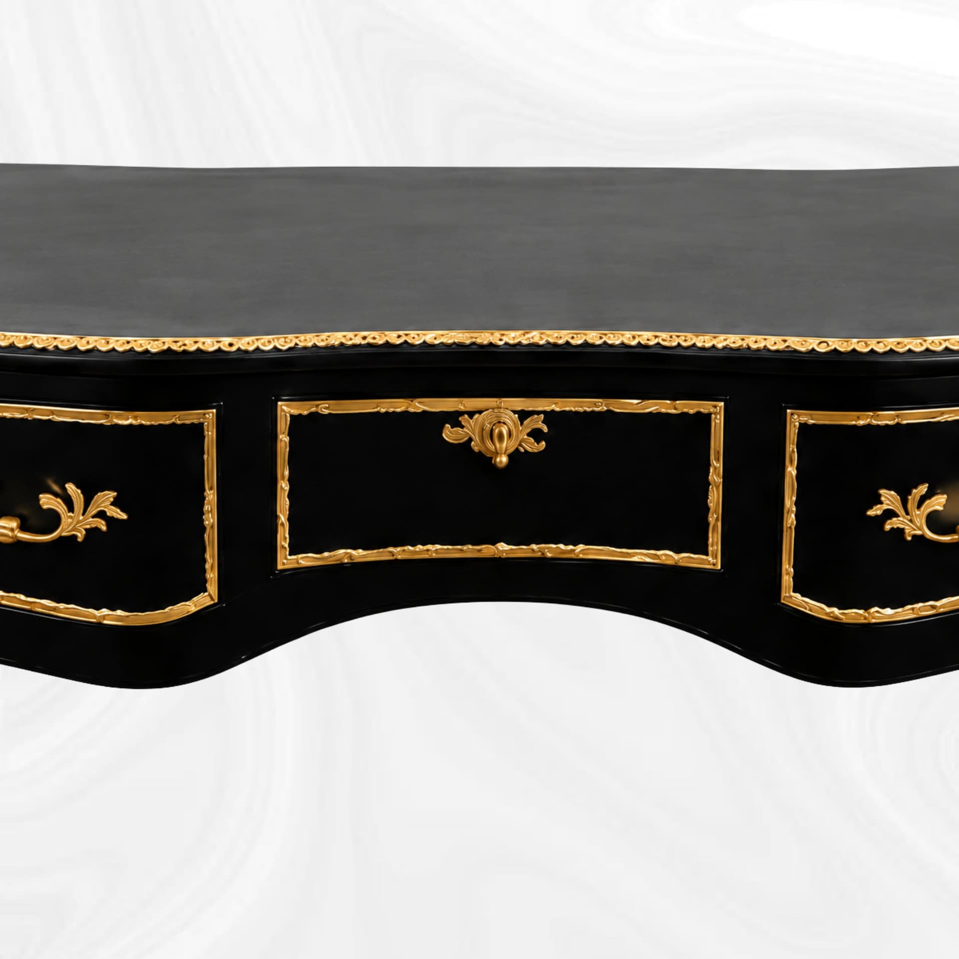 Detail of the black and gold desk front and drawers