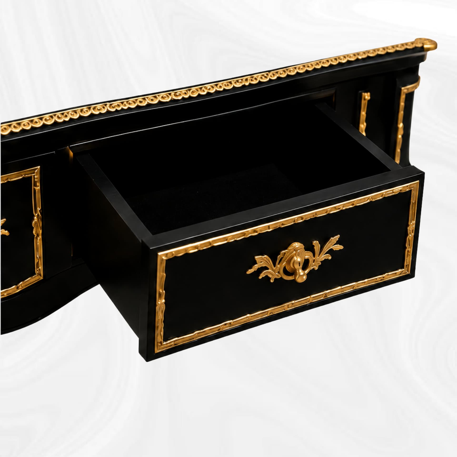 Open drawer of the black and gold writing desk