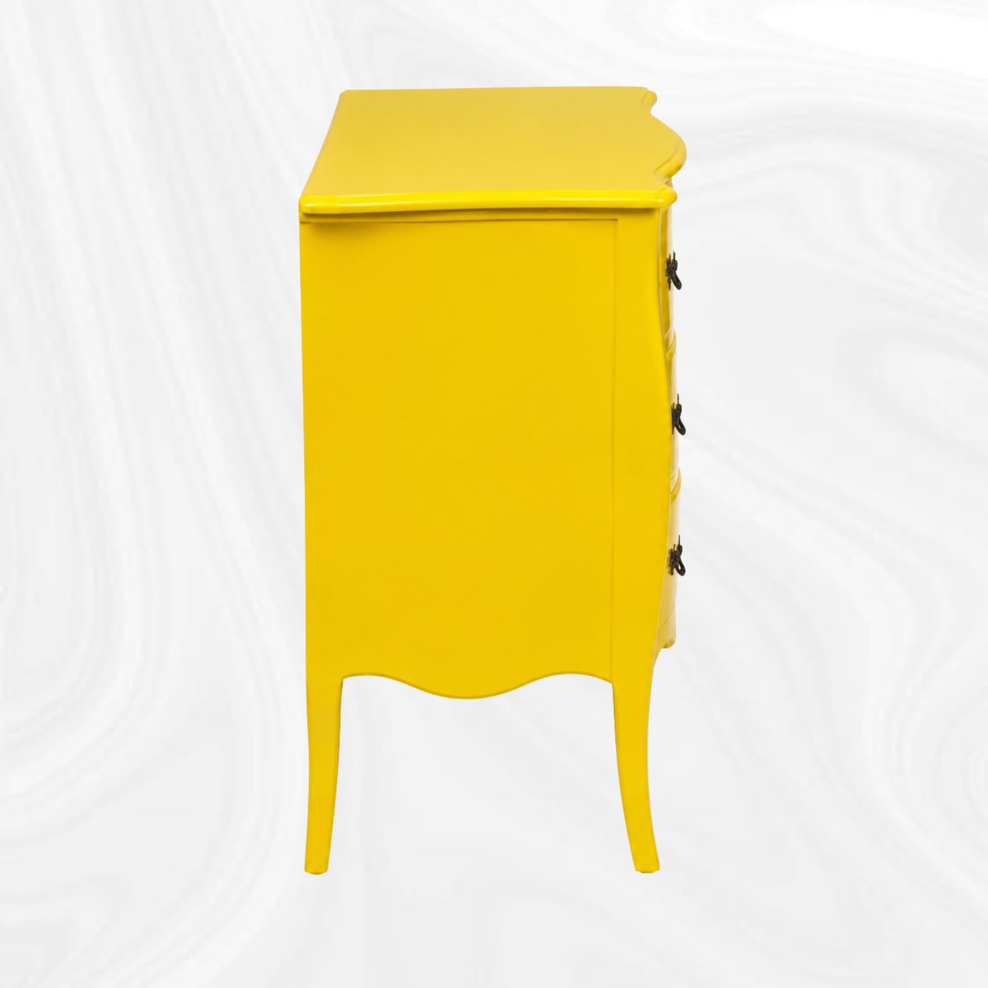 Commode galbee jaune, vue de profil